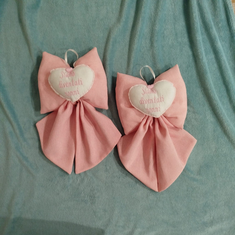 Pink "We're Grandparents" Birth Announcement Bows